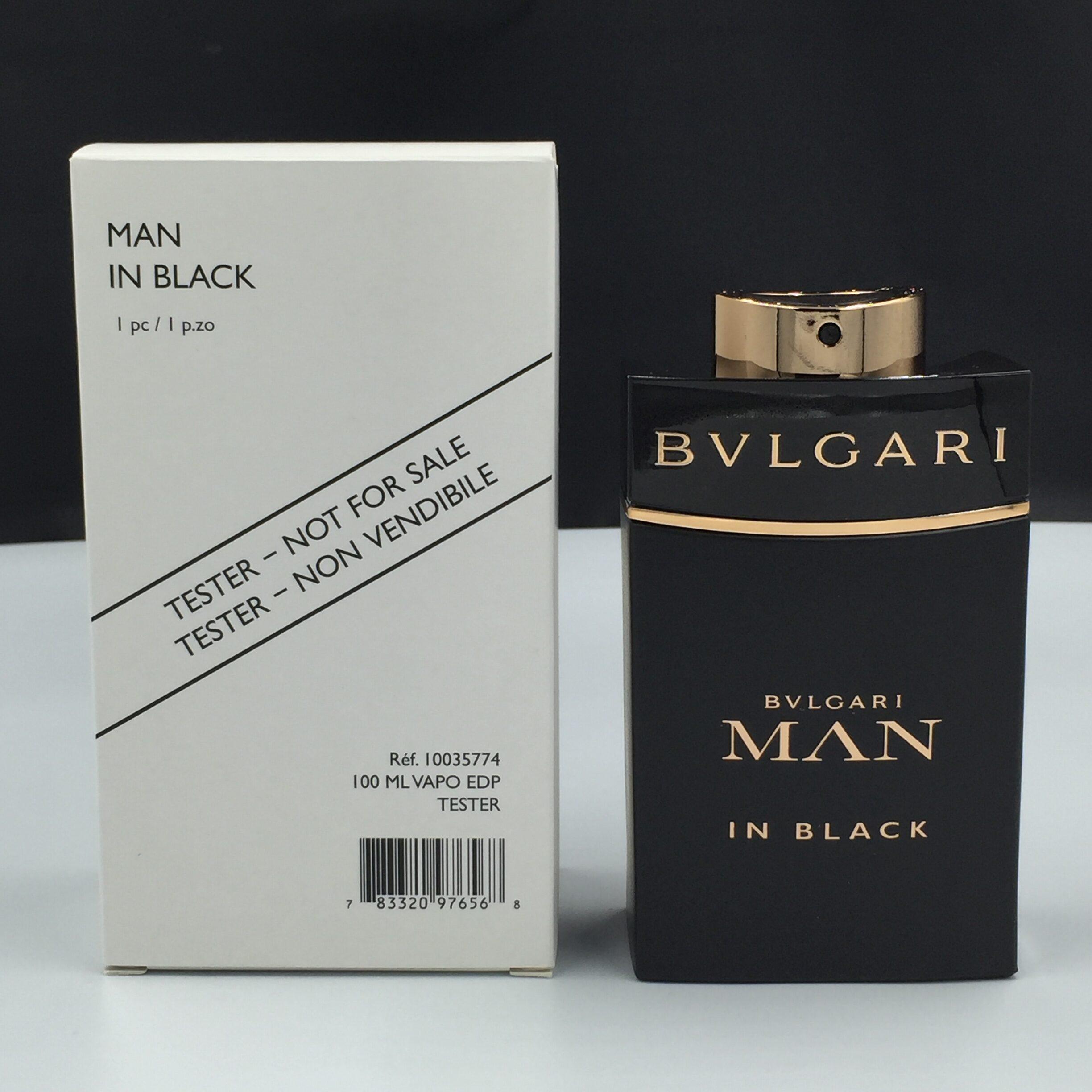 Tester Bvlgari Man In Black Eau De Parfum 100ml bottle, sleek black fragrance bottle with silver accents on a white background.