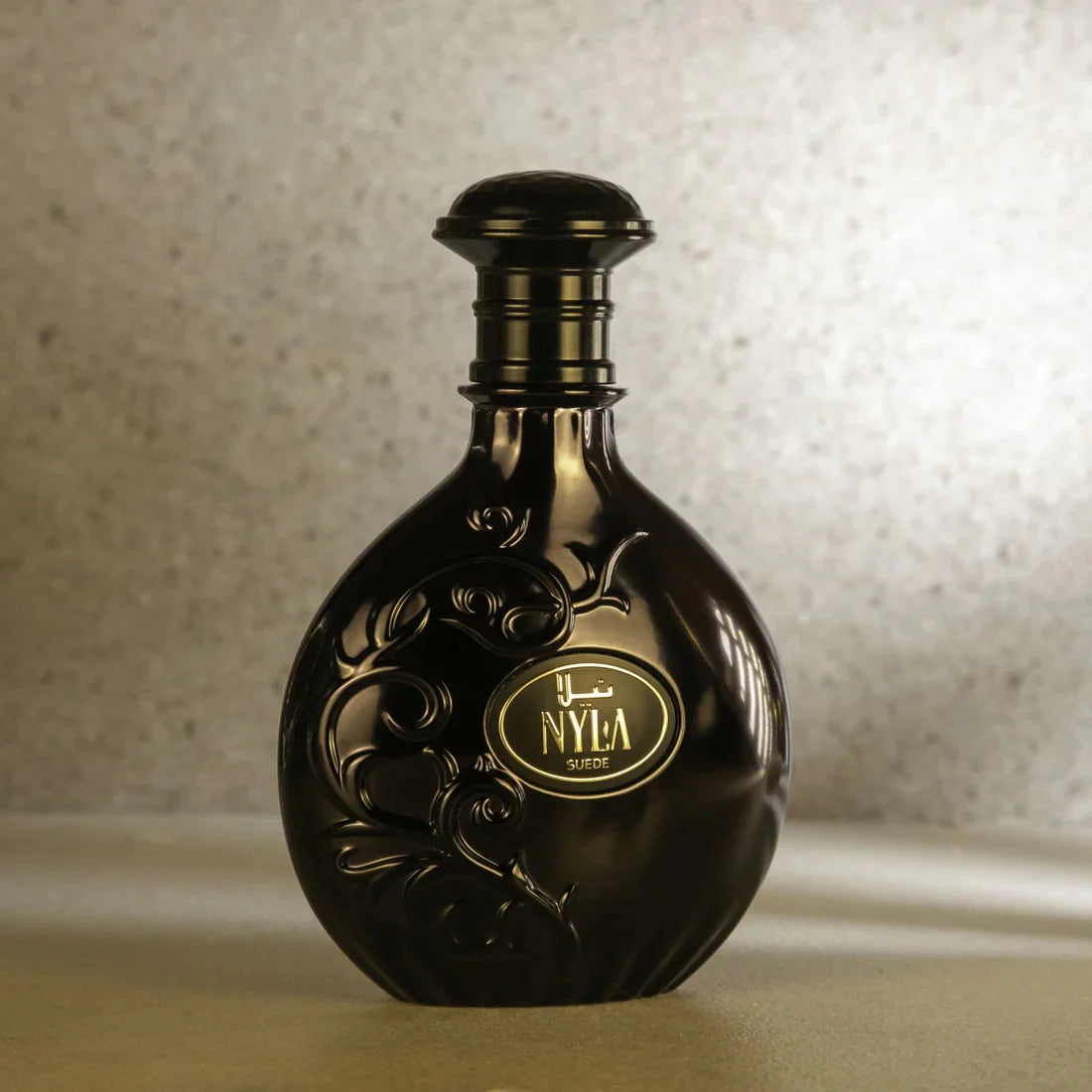 Arabiyat Prestige Nyla Suede Eau De Parfum 80ml for men and women, featuring elegant bottle with luxurious suede scent.